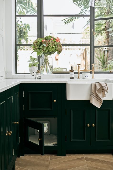 “We didn’t want to spoil our Crittall windows by inserting a hideous cat flap,” Lucy explains, “so Nicki came up with the idea of concealing it in the back of a cabinet and creating a bed for Buzz at the same time.” Small Utility Room Ideas, Flint House, Utility Room Ideas, Neptune Kitchen, Small Utility Room, Curved Cabinets, Crittal Windows, Small Utility, Victorian Terrace House