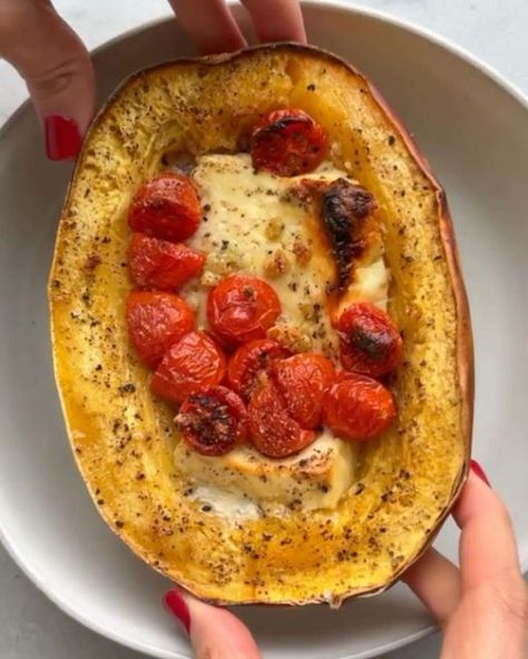 Healthy Eating on Instagram: "Baked Feta Pasta, but make it low carb! by @feelgoodfoodie

INGREDIENTS
1 spaghetti squash split in half and seeds removed
1 (8-ounce) block feta cheese
1 cup cherry tomatoes, halved
2 cloves garlic, minced
Salt and pepper, to taste
4 tablespoons olive oil
1 handful basil, chopped

INSTRUCTIONS
1. Preheat oven to 400°F degrees. Line a baking sheet with parchment paper.
2. Cut spaghetti squash in half lengthwise, scoop out the seeds and discard. Place cut side up in the prepared baking sheet.
3. Break the feta block in half and place each half in the middle of each squash half. Add the cherry tomatoes on top, along with the garlic and olive oil. Season with salt and pepper.
4. Bake until the feta cheese looks melty and golden brown on the edges and the spaghett Single Serve Meals, Baked Feta Pasta, Garlic And Olive Oil, Baked Feta, Feta Pasta, Spaghetti Squash Recipes, Squash Recipes, Spaghetti Squash, Veggie Dishes