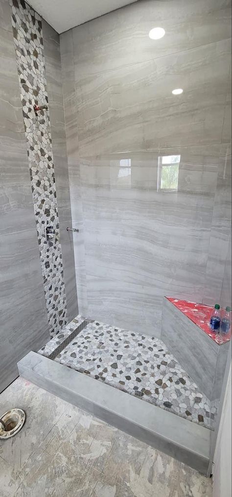 Inside Shower Tile Ideas, Waterfall Shower Ideas, Waterfall Tile Shower Design, Bathroom Decor Master Bath, Condo Bathroom Remodel, Decor Master Bath, Stone Shower Floor, Magnolia Bathroom, Pebble Tile Shower