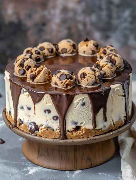 Chocolate Chip Cookie Dough Ice Cream Cake 🍦🍨   Ingredients 🙈  For the Cookie Crust: 1 ½ cups (about 20) chocolate chip cookies, crushed 🍪 5 tablespoons unsalted butter, melted 🧈 For the Ice Cream Layers: 1.5 quarts vanilla ice cream, softened 🍦 1.5 quarts chocolate chip cookie dough ice cream, softened 🍦 For the Cookie Dough Chunks: 1 cup all-purpose flour 🥣 ½ cup packed brown sugar 🍂 ¼ cup granulated sugar 🍬 ½ teaspoon salt 🧂 ½ cup (1 stick) unsalted butter, softened 🧈 Cookie Ice Cream Cake, Cookie Dough Ice Cream Cake, Chocolate Chip Cookie Dough Ice Cream, Birthday Cake Decorating Ideas, Cake Ice Cream, Cookie Dough Ice Cream, Cake Decorating Ideas, Yummy Comfort Food, Cookie Crust