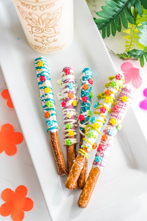 We Don't Talk About Bruno Unless We're Making These Encanto Chocolate Dipped Pretzel Rods Encanto Desserts, Encanto Treats, Encanto Crafts, Encanto Theme, Encanto Movie, Chocolate Dipped Pretzel Rods, We Don't Talk About Bruno, Dipped Pretzel Rods, Encanto Birthday