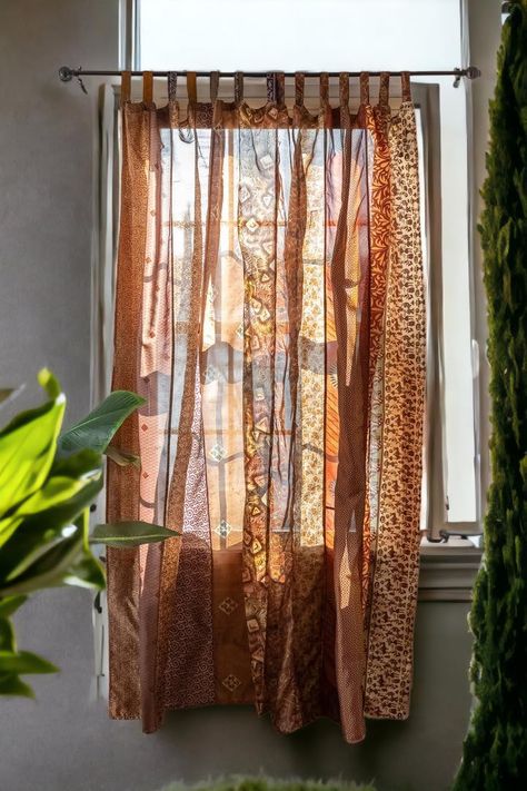 PRICES MAY VARY. Recycle Room Decor Curtains: Handcrafted from luxurious vintage Indian Silk Sari Material, our home patchwork curtain is an elegant and unique addition to any room. The trendy design adds texture and interest to the curtains, making them a stunning statement piece. Light Filtering & Breathable: These Indian sheer curtains allow sunlight to pass through your window and reduce its glare, offering your indoor spaces a flowing and effortless elegance. The lightweight curtains are ai Cortina Boho, Sari Curtains, Door Window Curtain, Patchwork Curtains, Handmade Curtains, Curtain For Door Window, Bohemian Curtains, Boho Curtains, Curtain Sizes