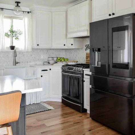 White Kitchen With Black Appliances, Over Kitchen Sink Lighting Ideas, Kitchen With Black Appliances, White Kitchen Black Appliances, Black Kitchen Knobs, Kitchen Cabinets With Black Appliances, Over Kitchen Sink Lighting, Kitchen Sink Lighting Ideas, White Cabinets Black Appliances