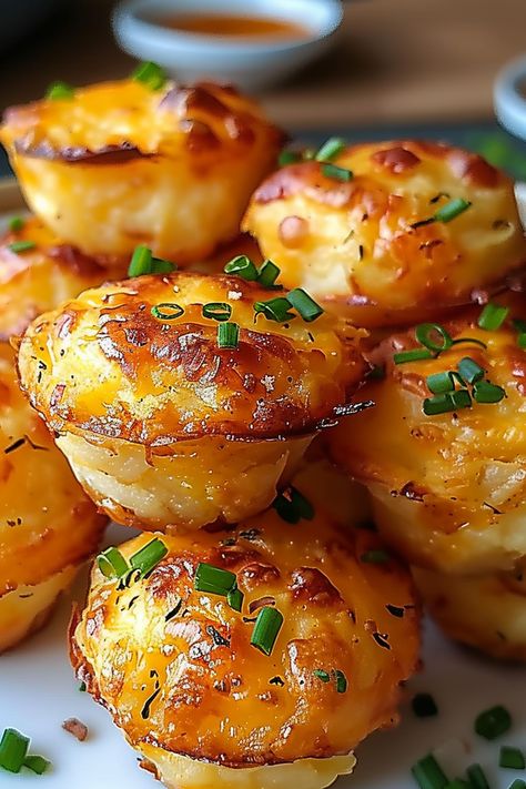 Golden Cheesy Potato Puffs arranged on a white platter Golden Cheesy Mashed Potato Puffs, Potatoes Muffin Cups, Easy Appetizers With Potatoes, Mashed Potato Muffin Cups, Mini Potato Appetizers, Cheesy Potato Puffs, Cold Potato Appetizers, Potato Apps, Fast Potato Recipes