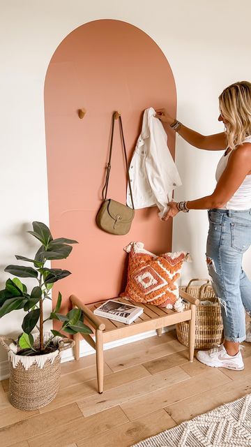 Sarah Joy on Instagram: "Easy idea to transform an empty wall in under 30 minutes 🙌🏻🙌🏻 I found this pretty arched wall decal on Amazon + immediately ordered it. It was super easy to put up (just have a helper!) and such a fun way to make a focal point in any room. The wooden pegs are also from Amazon. I’ll link it all in my profile 🧡" Half Painted Walls, Hall Entrada, Sarah Joy, Arched Wall, Deco Studio, Hallway Design, Ideas Hogar, Book Nook, Slow Life