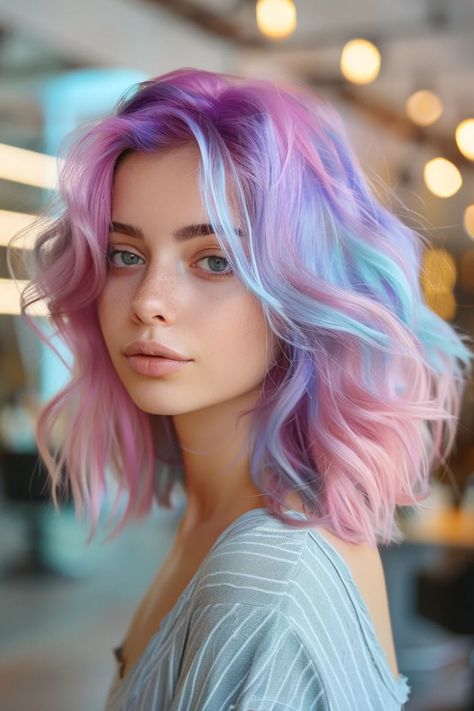 Person with colorful pastel hair in shades of pink, blue, and purple, wearing a striped shirt, looking at the camera. Iridescent Hair Color, Pastel Rainbow Hair Color, Pastel Pink And Purple Hair, Fun Hair Colors, Rainbow Hair Color Ideas, Pale Foundation, Pink And Purple Hair, Mermaid Goddess, Pastel Pink And Purple