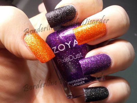 Zoya Dhara (orange), Dahlia (black) and Carter (purple, bottle). Halloween 2013 manicure. Purple And Orange Halloween Nails Acrylic, Matte Black And Orange Halloween Nails, Purple Green Orange Nails, Purple Orange Nails Halloween, Black And Orange Ombre Nails Halloween, Purple Orange And Black Nails, Orange Glitter Halloween Nails, Purple Orange Halloween Nails, Black Orange And Purple Nails