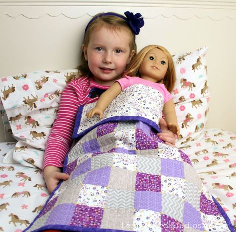 The pattern and tutorial for Annabel's American Girl patchwork doll quilt is up on the Pellon web site. Finished size is 16 x 24", and it's a great beginner project for someone with basic quilting skills. It also includes some simple hand embroidery. Please go here to check it out... American Girl Doll Quilt, Patchwork Doll, Quilted Christmas Gifts, Baby Doll Bed, Basic Quilt, American Girl Doll Clothes Patterns, Patchwork Baby, Doll Beds, Doll Bed