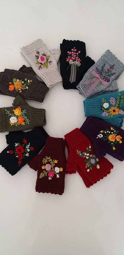 Each glove has a flower design on it. The natural fiber of the yarn keeps these wrist warmers soft and warm.
Knitted from wool yarn, these gloves are very warm and stylish.
Vivid colors with floral embroidery make these gloves unique.

It will make you look more stylish😊 Perfect gift for your lover, lover and yourself. We know you will love our gloves.
My small embroidered fingerless knit gloves will add beauty to you. Embroidered Gloves, Autumn Accessories, Half Gloves, Crochet Bracelet Pattern, Ladies Gloves, Bracelet Crochet, Gloves Pattern, Crochet Fingerless Gloves, Fingerless Gloves Knitted