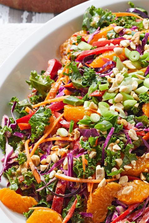 Fresh orange juice and ginger brighten the Asian flavors of the dressing in this Chinese Cabbage Salad. When selecting mandarin oranges at the store, opt for ones that are a bit firm to slightly soft, with a noticeable citrus fragrance. Salad With Mandarin Oranges, Chinese Cabbage Salad, Chinese Salad, Vegan Chinese, Dijon Dressing, Cabbage Salad Recipes, Fresh Orange Juice, Forks Over Knives, Mandarin Oranges