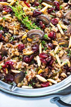 Crock Pot Stuffing with Wild Rice, Cranberries, and Almonds. The BEST gluten free stuffing recipe. The slow cooker does the work. Easy and everyone loves it! Perfect make ahead side for Thanksgiving. {vegan, dairy free} Recipe at wellplated.com | @wellplated Crock Pot Stuffing, Crockpot Thanksgiving, Gluten Free Stuffing Recipes, Crockpot Stuffing, Vegan Slow Cooker Recipes, Gluten Free Stuffing, Rice Stuffing, Vegan Slow Cooker, Vegan Thanksgiving Recipes