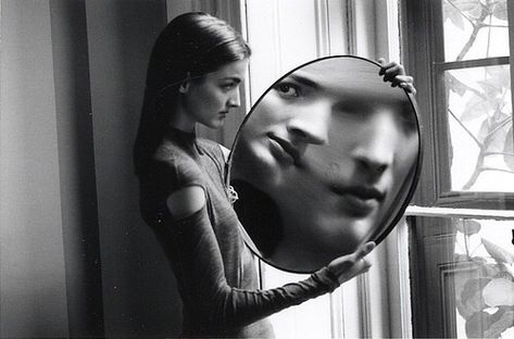 Girl holding a mirror with a distorted reflection Distortion Photography, Duane Michals, Photo Sequence, Mirror Photography, Nancy Reagan, Robert Frank, Cindy Sherman, Willem De Kooning, Old Photography