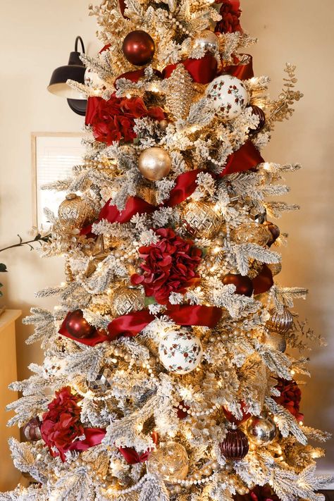 A maroon and gold elegant Christmas tree with strands of pearls, gold beaded garland and florals. This Christmas tree is so beautiful it could be in a hotel lobby. Pearls Christmas Tree, Floral Christmas Tree, Weekend Crafts, Elegant Christmas Trees, Elegant Christmas, Beaded Garland, Hotel Lobby, Deck The Halls, Christmas 2024