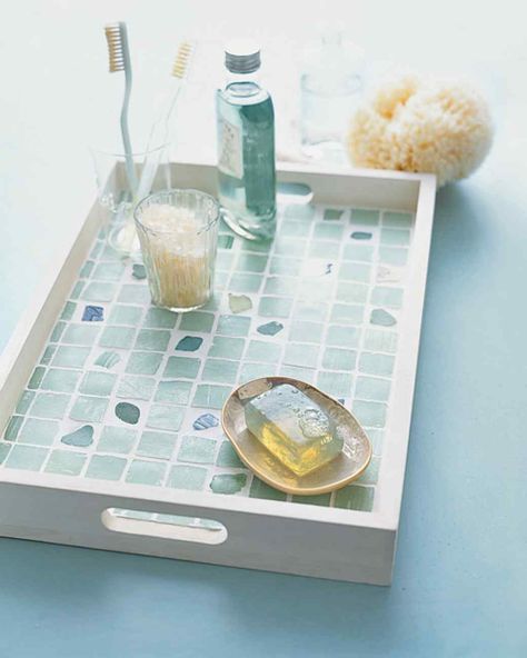 Sea glass, the ocean's most overlooked treasure, can be used to make anything from a pair of earrings to a dazzling seaside-inspired tabletop. Sea Glass Tile, Sea Glass Diy, Sea Glass Mosaic, Mosaic Tray, Tile Crafts, Sea Glass Crafts, Geometric Tiles, Glass Tray, Beach Crafts