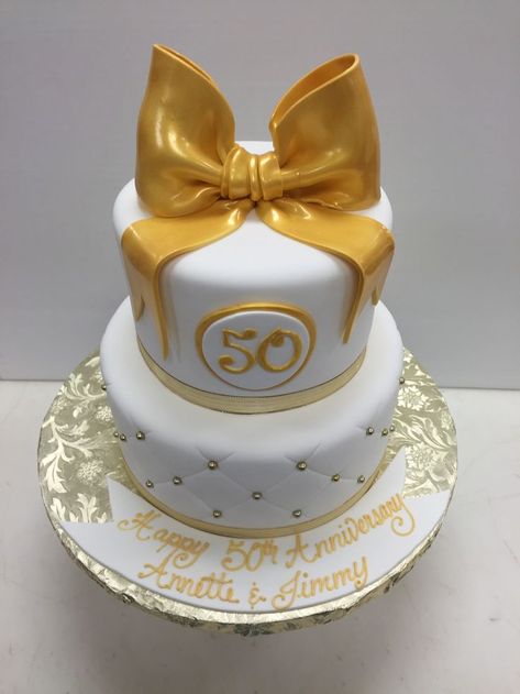 2 tier fondant cover cake with 3D fondant bow, fondant plack, and quilted with gold swiss dot 2 Tier Fondant Cake, Fondant Bow, Cake Cover, Fondant Cake, Swiss Dot, Tiered Cakes, Cake Art, Beautiful Cakes, Cupcake Cakes