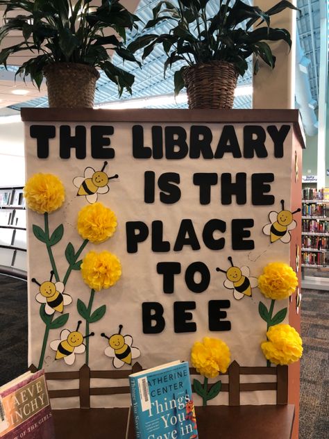 Library Is The Place To Bee, Cricut Projects For School Library, May Book Displays Library, Easy Library Bulletin Board Ideas, Bee A Reader Bulletin Board, National Library Week Display, Spring Library Programs, Library Spring Displays, April Library Bulletin Boards