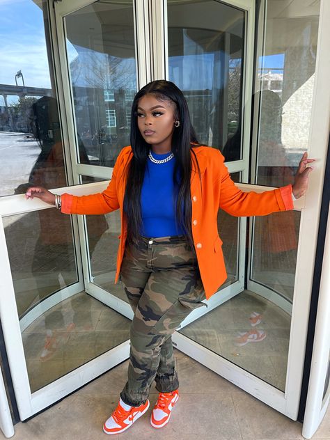 Camo Pants Outfit Black Women Sneakers, Camouflage And Orange Outfit, Camo Pants With Blazer Outfit, Dunks And Blazer Outfit, Orange Blazer Outfits Fall, Blue And Orange Outfit Black Women, Orange And White Dunks Outfits, Camo And Orange Outfit, Orange And Camo Outfit