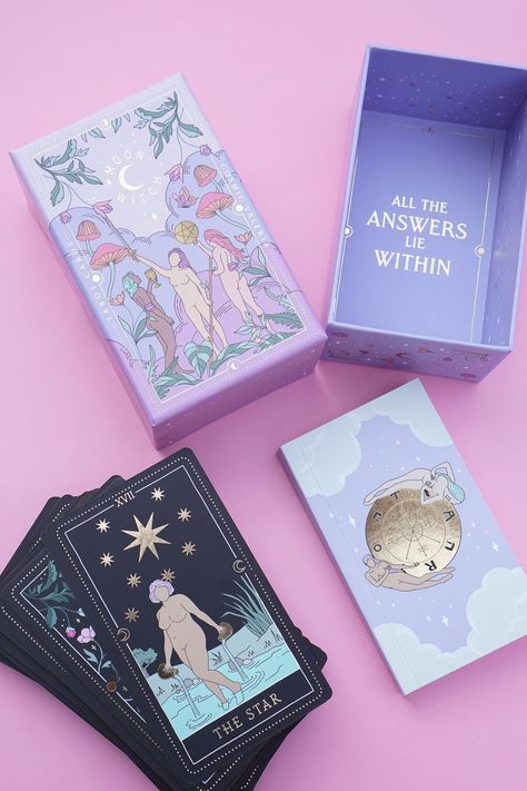 Introducing the special edition of the Bestselling Moon Witch Tarot Deck! This beautifully crafted set now comes in a stunning pink box and features smaller cards ( 2.75 by 4.75 inches ) - offering a traditional size that's familiar to most tarot readers. This special edition is all about practicality. The smaller size makes the cards more comfortable to shuffle, easier to handle during readings, and perfect for on-the-go divination. Whether you're tossing the deck into your bag for a spontaneou Tarot Box Design, Beautiful Tarot Decks, Cute Tarot Cards, Tarot Cards Decks, Tarot Cards Decks Beautiful, Spiritual Accessories, Tarot Shop, Witchy Business, Witches Tarot Deck