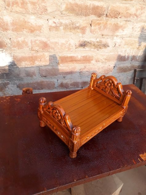 Krishna bed Pooja Chowki, Laddoo Gopal, Wooden Temple For Home, Wooden Cradle, Wooden Temple, Krishna Temple, Door Design Photos, Brick Detail, 3d Art Drawing