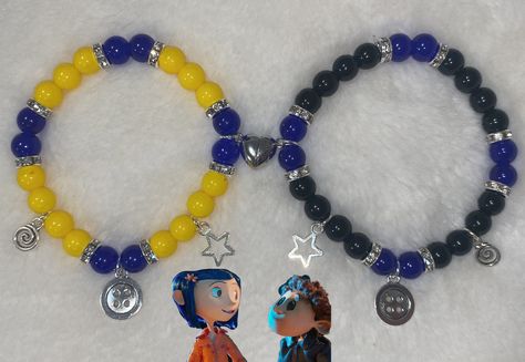 Coraline and Wybie Matching couples yellow and blue with silver button , swirl , & start charm bracelets . Coraline Charm Bracelet, Matching Coraline Bracelets, Matching Glass Bead Bracelets, Coraline And Wybie Bracelets, Coraline Bracelet Ideas, Matching Bead Bracelets For Couples, Matching Bracelets Ideas, Coraline Bracelet, Glass Beads Bracelet Ideas