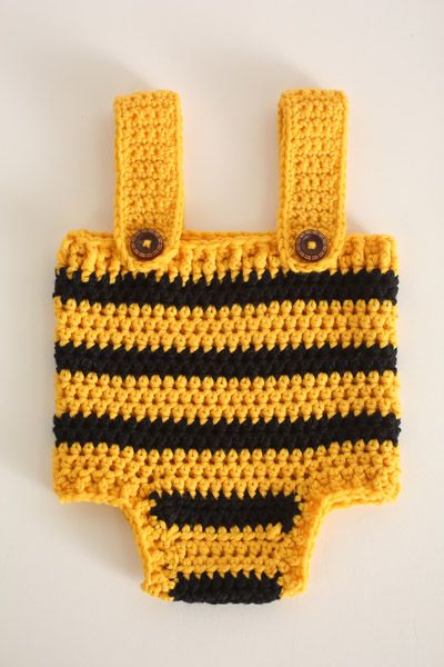 What better way to celebrate baby's first Halloween than with an adorable bumble bee outfit! The hat and playsuit each feature black and yellow stripes running down them to create the perfect bumble bee effect! The hat features two large antenna, while the playsuit features a ribbed section and two straps to achieve a snug fit around baby's waist! Crochet Bee Costume, Crochet Baby Romper Free Pattern, Baby Bumble Bee Costume, Bumble Bee Outfit, Bee Outfit, Crochet Baby Romper, Baby Bumble Bee, Bumble Bee Costume, Crochet Baby Costumes