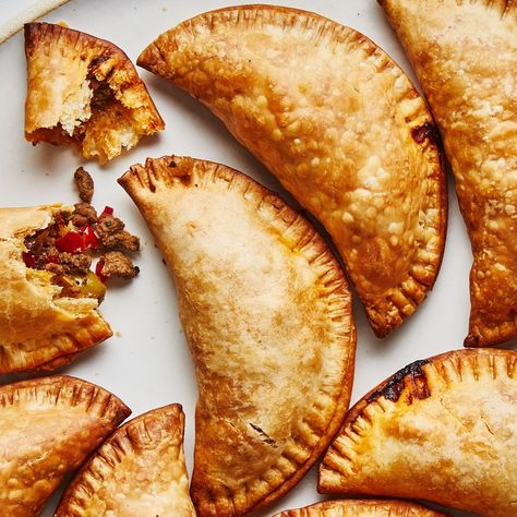 There are as many variations of empanadas as there are cooks in Argentina. This version was developed by BA Test Kitchen Manager Gaby Melian, who is from Buenos Aires and was taught as a little girl by family members how to make them. After years of perfecting her method, she prefers the empanadas baked, not fried, and the addition of green olives and raisins in the filling is essential. Baked Empanadas, Beef Empanadas Recipe, Chicken Empanadas, Beef Empanadas, Puff Pastry Dough, Empanadas Recipe, Pastry Dough, Filling Recipes, How To Dry Oregano