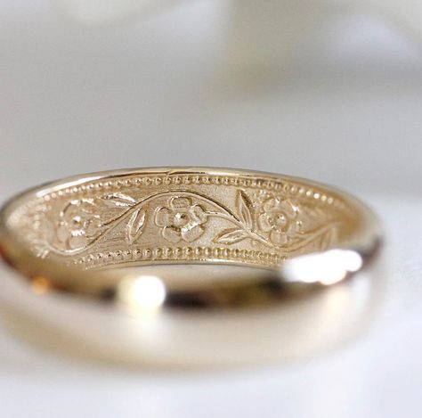 This 14k yellow gold ring is 6mm wide and domed on the outside. It features my petunia pattern on the inside. The five-petaled flowers and their leafy vine weave their way around the band. This is a great traditional band on the outside made to match a companion ring with the same pattern outside.  It's a great ring for everyday wear. A wonderful, heirloom-quality wedding band that can one day be passed down to the next generation. Also available in 14k rose gold and 14k white gold. Please note, Ring With Flowers, Floral Wedding Band, Sakura Wedding, Non Traditional Wedding Ring, Romantic Wedding Rings, Traditional Wedding Rings, Floral Wedding Ring, Floral Wedding Bands, Flower Wedding Ring