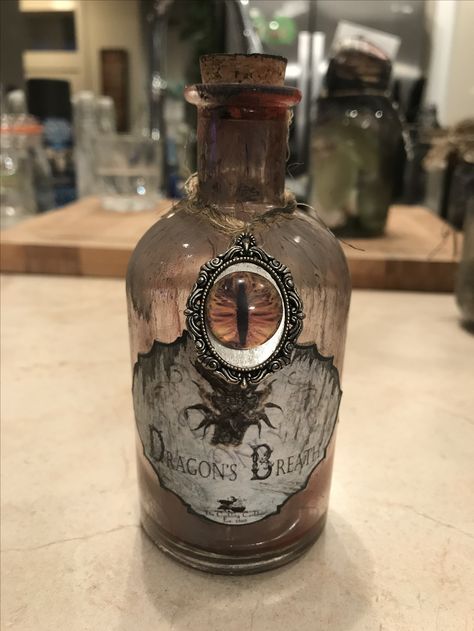 Dragon's Breath potion. Poison Potion Bottle, Poison Potion, Halloween Potion, Snake Oil, Halloween Potion Bottles, Halloween Apothecary, Halloween Bottles, Halloween Potions, Magic Bottles