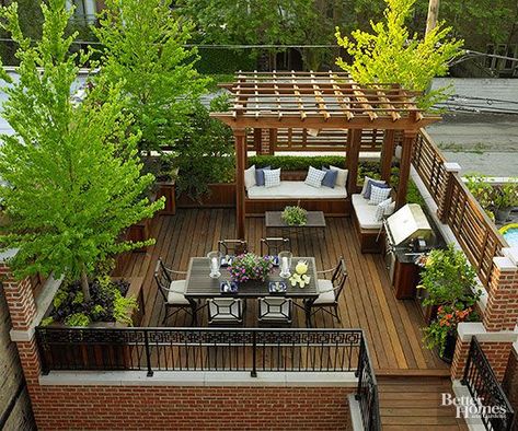 Accessible from the home's kitchen, this garage-top roof deck was designed with entertaining in mind. A dining table seats six with ease, while a built-in grill and cabinets for storing table-service items reduce trips into the house. Large trees break up views of power lines and an alley. Roof Terrace Design, Urban Garden Design, Rooftop Patio Design, Roof Garden Design, Outdoor Terrace, Terrace Garden Design, Rooftop Design, Rooftop Terrace Design, Pergola Design