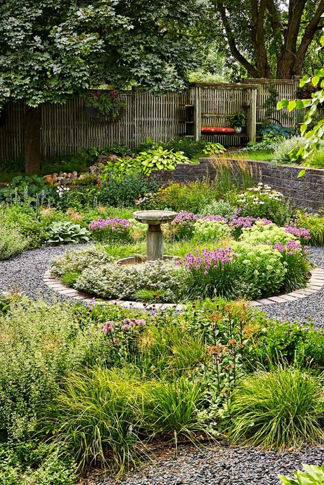 Create a dreamy farmhouse landscape with these tips and ideas that celebrate Americana. Evoke the beautiful yet practical farmhouse landscaping aesthetic with simple design elements such as naturalistic plantings, using local materials, and rustic seating. #farmhouse #landscapingideas #bhg Circular Garden Design, Acreage Landscaping, Front Garden Landscape, Farmhouse Landscaping, Easy Landscaping, Landscape Elements, Farmhouse Garden, Garden Borders, Country Style Homes