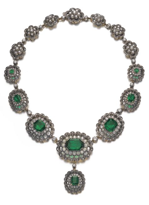 An antique emerald and diamond necklace, late 19th century. Composed of clusters set with step-cut emeralds, framed with circular-cut diamonds, the largest central emerald weighing 15.00 carats, length approximately 480mm, fitted case stamped Hugo Strömdahl. Emerald And Diamond Necklace, Jewellery Vintage, Antique Pendant, Jewelry Antique, Step Cut, Royal Jewels, Buying Diamonds, Royal Jewelry, Statement Necklaces