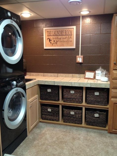 Brown cinder block wall. Stylish Laundry Room, Room Storage Diy, Basement Laundry Room, Laundry Space, Basement Laundry, Basement Makeover, Laundry Room Remodel, Small Laundry Rooms, Small Laundry Room