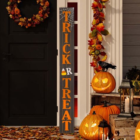 This charming vertical proch sign, features the message "Trick or Treat" in orange on a black wood background. This wooden sign is of MDF, finished in black, black finish to give a festival atmosphere. This sign makes a distinctive home decor item, you can use it to decorate areas such as your loft, foyer, porch or living area. The care and maintenance required for this item is minimal; just a gentle wipe with a damp cloth will suffice.Letters are oversized and feature a painted red finish.Easy Front Porch Signs Wooden Diy Halloween, Tall Fall Porch Signs, Happy Halloween Porch Signs, The Witch Is In Porch Sign, Halloween Vertical Porch Sign, Wooden Halloween Signs, Halloween Porch Sign, Festival Atmosphere, Cricut Signs