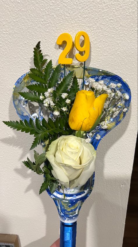 Parents loved getting these lacrosse bouquets from their seniors. Lacrosse Bouquet, Senior Night Gift Ideas Lacrosse, Lacrosse Senior Night, Lacrosse Party Decorations, Senior Basket, Raffle Gift Basket Ideas, Lacrosse Party, Senior Night Posters, Lacrosse Coach