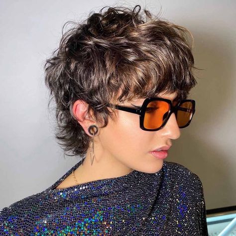 25 Whimsical Pixie Wolf Cut Ideas | HairAide Short Pixie Shag Haircut, Pixie Wolf Cut Hair, Wolf Pixie Cut, Grey Wolf Cut, Curly Pixie Mullet, Short Pixie Mullet, Pixie Wolf Cut, Short Curly Wolf Cut, Mullet For Women