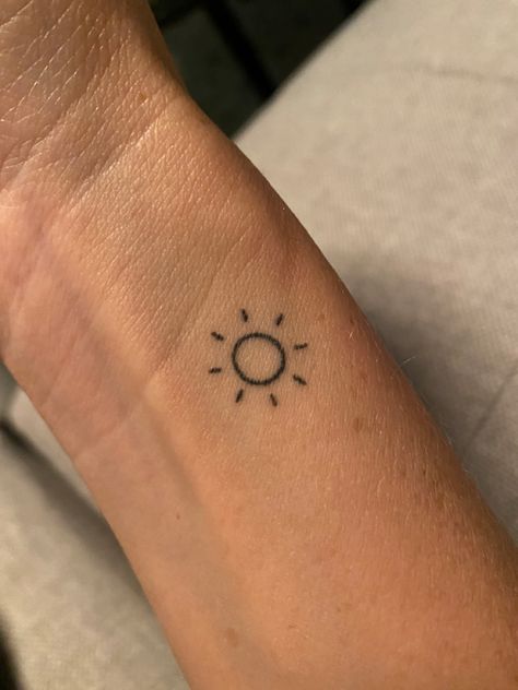 Mini Sun Tattoo Simple, Sunshine Tattoo Wrist, Sun On Wrist Tattoo, Sun Tattoo Small Wrist, Small Sun Wrist Tattoos, Tiny Sunshine Tattoo, Simple Sunshine Tattoo, Fine Line Sunshine Tattoo, Henna Sun Design