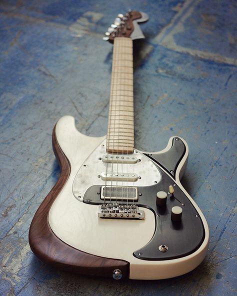 Richard on Instagram: “Custom Ahab. Walnut and cream. Brushed acrylic and aluminium pickguard.  www.indraguitars.com” Custom Guitars Electric, Guitar Amp Stand, Guitar Sculpture, Guitar Finishes, Pretty Guitars, Esp Guitars, Music Theory Guitar, Acoustic Guitar Music, Boutique Guitar