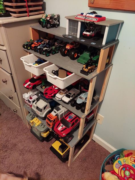 Big Toy Car Storage Ideas, Big Toy Truck Storage Ideas, Car Toy Storage Ideas, Diy Garage For Toy Cars, Toy Tractor Storage, Diy Toy Car Storage, Toy Truck Storage Ideas, Large Toy Truck Storage Ideas, Playroom Toy Storage Ideas