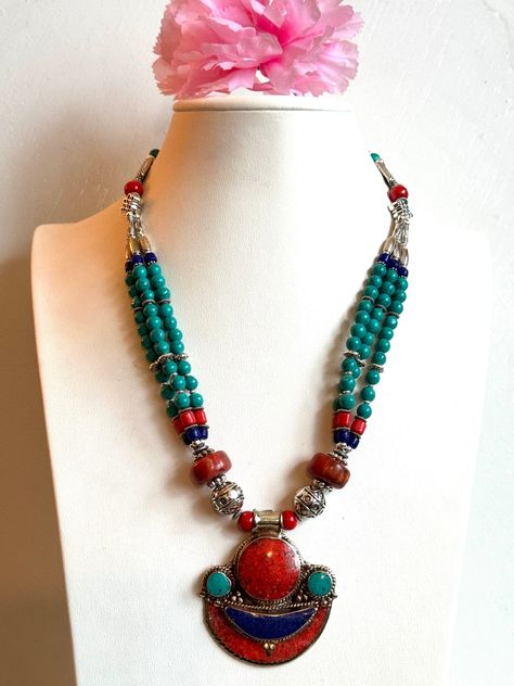 This beautiful looking Tibetan boho tribal theme handmade necklace is 19"inches long and weighs around 96 grams.This beautiful necklace is made from tibetan silver inlaid with turquoise,coral and lapis stone by skilled artisan from Nepal. Great piece to add with your jewelry collection from asia.Thank you. Tibetan Necklace, Lapis Stone, Beautiful Pendant Necklace, Turquoise Jewelry Native American, Necklace Design, Stone Pendant Necklace, Wedding Jewellery Necklace, Kundan Jewellery, Coral Turquoise