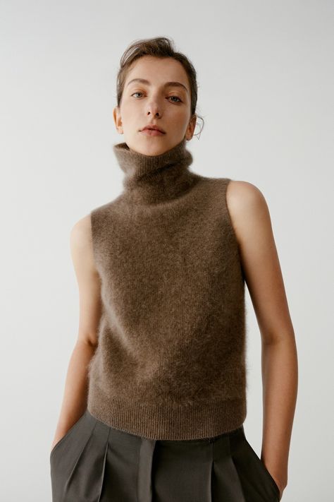 Chestnut brown sleeveless turtleneck cashmere jumper. Shop ethical clothing for women crafted from high-quality natural materials. Express shippings and free returns. Brown Turtleneck, Fabric Drawing, Women Crafts, Sleeveless Jumper, Sleeveless Turtleneck, Cashmere Jumper, Chestnut Brown, Ethical Clothing, Soft Summer