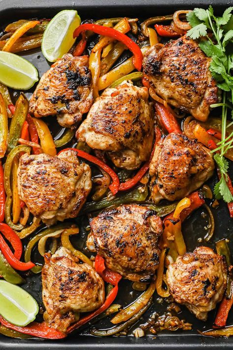 These quick and easy keto Sheet Pan Chicken Fajitas are a delicious spin on traditional fajitas. The perfectly spiced chicken thighs are crispy on the outside, while tender and juicy on the inside. Cooked with a medley of sliced peppers and onions. This dish can be ready and on the table in less than 30 minutes. Chicken Thigh Fajitas, Keto Sheet Pan, Noom Recipes, Sheet Pan Chicken Fajitas, 2024 Meals, Chicken Lickin, Peace Love And Low Carb, Man Recipes, Keto Eating