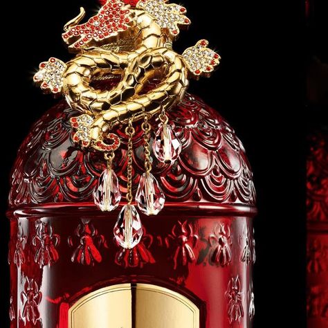 Guerlain on Instagram: "Guerlain celebrates the Year of the Dragon with a breathtaking reinterpretation of the Bee Bottle, imagined in glittering scarlet by L’Atelier Truscelli for Lunar New Year. A limited-edition series of numbered collector’s pieces, brimming with the complex notes of Néroli Outrenoir from L’Art et La Matière Collection. — #GuerlainFragrance #LunarNewYear #YearOfTheDragon #RarePerfume #BeeBottle #IconicScent #PerfumerSince1828" Dragon Bottle, Guerlain Perfume, Perfume Lover, Packaging Labels Design, Year Of The Dragon, The Bee, Lunar New Year, Lunar New, The Dragon