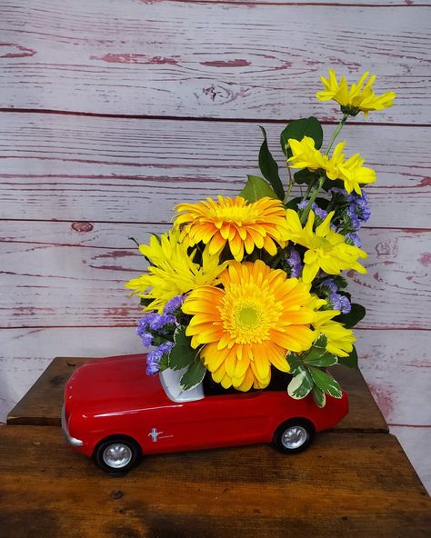 🌟🚗 Celebrate Father's Day with a Unique Bouquet from Davis Floral Co.! 🌸🚗 Father's Day is this Sunday, and we have the perfect way to show Dad you care! Let us create an amazing bouquet in a keepsake container shaped like a Ford Mustang or Pickup. Yes, Dad likes flowers too! 🌹💐 Call us at 325-646-9595, check out our website at www.davisfloralco.com or come by and see these unique arrangements in person. Each bouquet can be customized to fit your dad's personality, so for the best results, g... Unique Bouquet, Ford Mustang, Mustang, Fathers Day, Father's Day, Ford, Let It Be, Canning, Celebrities