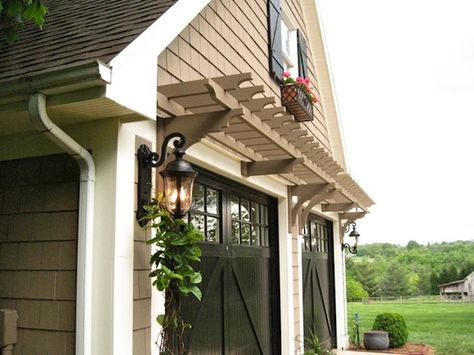 17 Easy Curb Appeal Ideas Anyone Can Do Solar Lights for Trees From: http://www.listotic.com/17-easy-and-cheap-curb-appeal-ideas/15/ Garage Arbor, Pergola Garage, Easy Curb Appeal Ideas, Garage Pergola, Best Garage Doors, Pergola Lighting, Exterior Makeover, Casa Exterior, Ranch Style Home