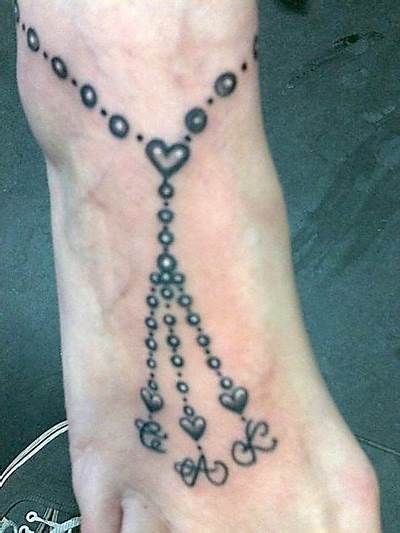 19 Ankle Bracelet Tattoos ideas | ankle bracelet tattoo, tattoos ... Braclet Tattoo, Men's Ankle Bracelet, Bracelet Tattoos, Aries Tattoos, Ankle Tat, Rosary Tattoo, Chain Tattoo, Ankle Bracelet Tattoo, Bracelet Tattoo