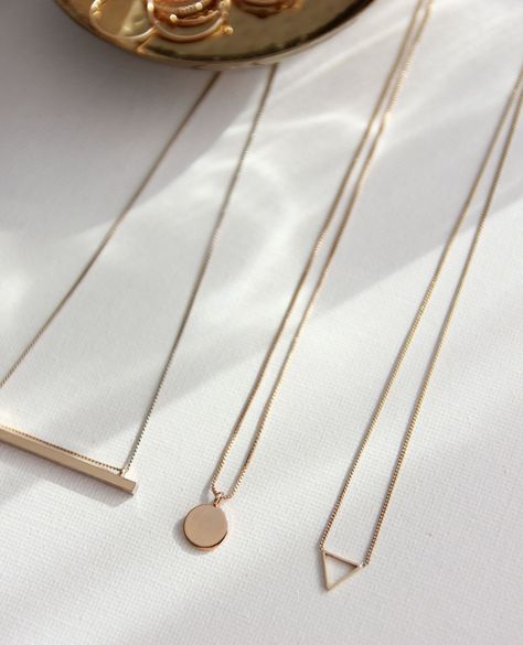 Minimalist magic! ✨ ⁠ ⁠ Explore the elegant simplicity of our rose gold necklace collection, featuring sleek geometric shapes and a classic pendant. ⁠ ⁠ Perfect for layering or as standalone pieces, these necklaces offer a subtle touch of sophistication to any outfit.⁠ ⁠ #accessories #gold #handmadejewelry #love #style #jewelrydesigner #silver Accessories Gold, Necklace Collection, Love Style, Rose Gold Necklace, Gold Jewellery, Geometric Shapes, Gold Jewelry, Layering, Gold Necklace