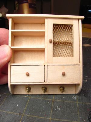 1 INCH SCALE HANGING WALL CABINET MADE FROM BASSWOOD -- How to make a 1 inch scale hanging wooden wall cabinet for your dollhouse. Dollhouse Furniture Tutorials, Dollhouse Miniature Tutorials, Doll Furniture Diy, Diy Doll Miniatures, Doll House Plans, Miniature Dollhouse Furniture, Dollhouse Miniatures Diy, Miniature Diy, Miniatures Tutorials