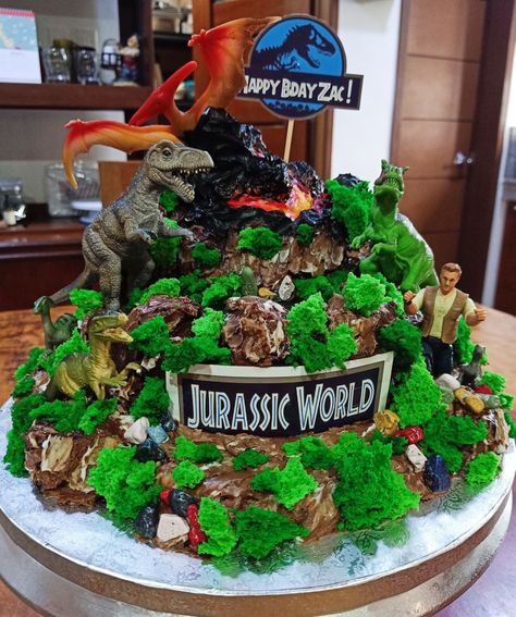 Jurassic World Theme cake
Volcano with Lava Cake
Dinosaur Cake 
Edible grass and rocks Jurassic World Cake, Edible Grass, World Cake, Lava Cake, Dinosaur Cake, Lava Cakes, Theme Cake, Jurassic World, Themed Cakes