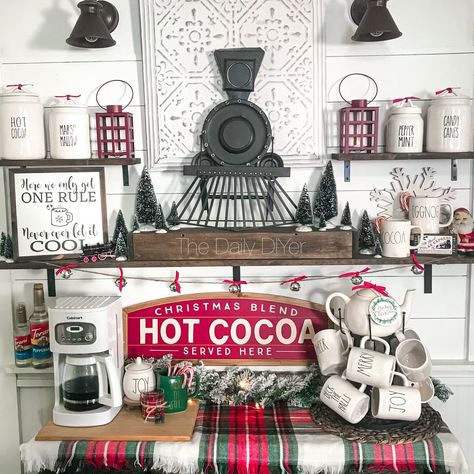 The Coffee Bar turned Hot Cocoa Bar with a Polar Express Theme this Christmas! The movie inspired this winter and Christmas look. From a DIY Wood sign, train ticket, garlands and Dollar Tree DIYs - it all came together to make the kitchen extra festive this year! I also include a tour of our Kitchen Entryway. I love my coffee bar because it is a place for me to store my Rae Dunn collection and stay with the farmhouse theme I love to so much! Polar Express Hot Cocoa Bar, Holiday Coffee Bar, Polar Express Theme, Diy Inspiration Board, Diy Wood Sign, Hot Cocoa Cookies, Cocoa Drink, Farmhouse Theme, Coffee Bar Design