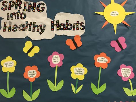 Spring Nurse Bulletin Boards, April Bulletin Board Ideas College, Spring Bulletin Board Ideas For Work, Staff Bulletin Boards, Floral Classroom, Physical Education Bulletin Boards, April Bulletin Boards, Pe Bulletin Boards, Counseling Bulletin Boards